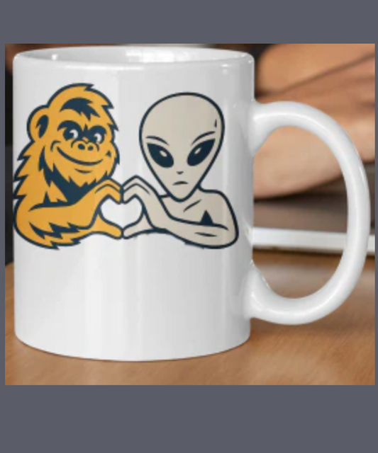 Sasquatch and Alien love. Great gift for Sasquatch and Alien enthusiasts. White 15oz Ceramic Mug
